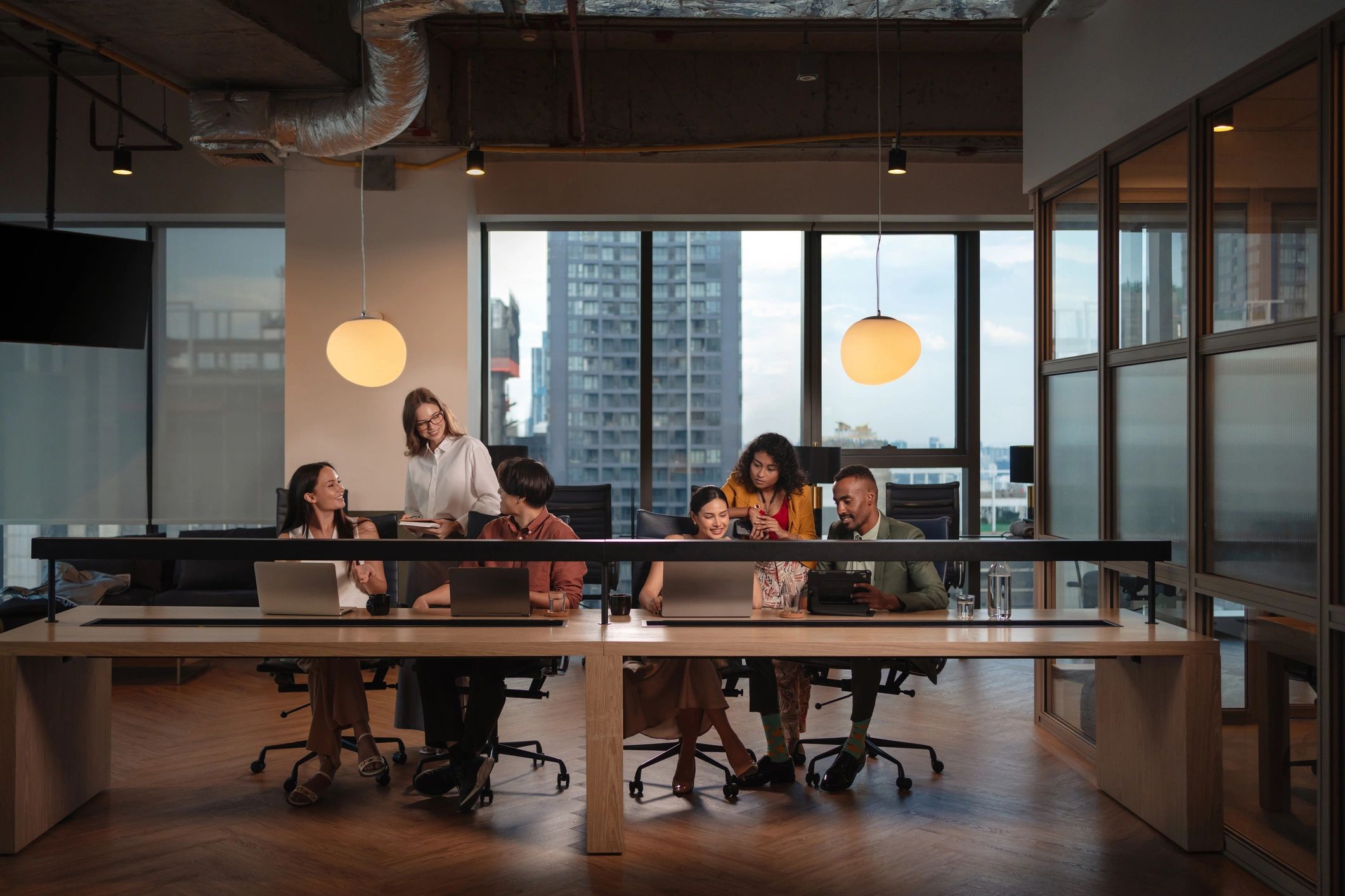 Environmental consulting team collaborating in a professional office