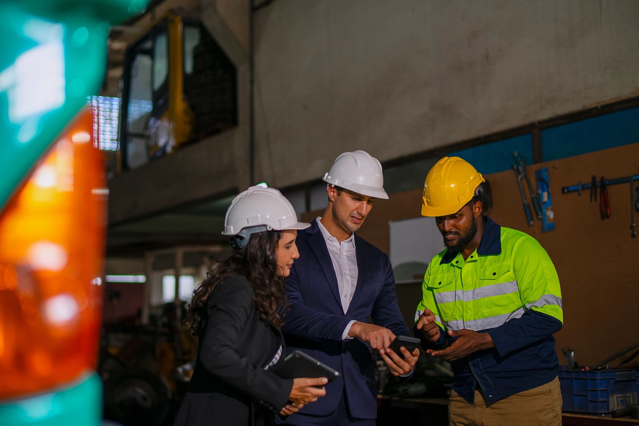 Consulting team reviewing plans at a project site