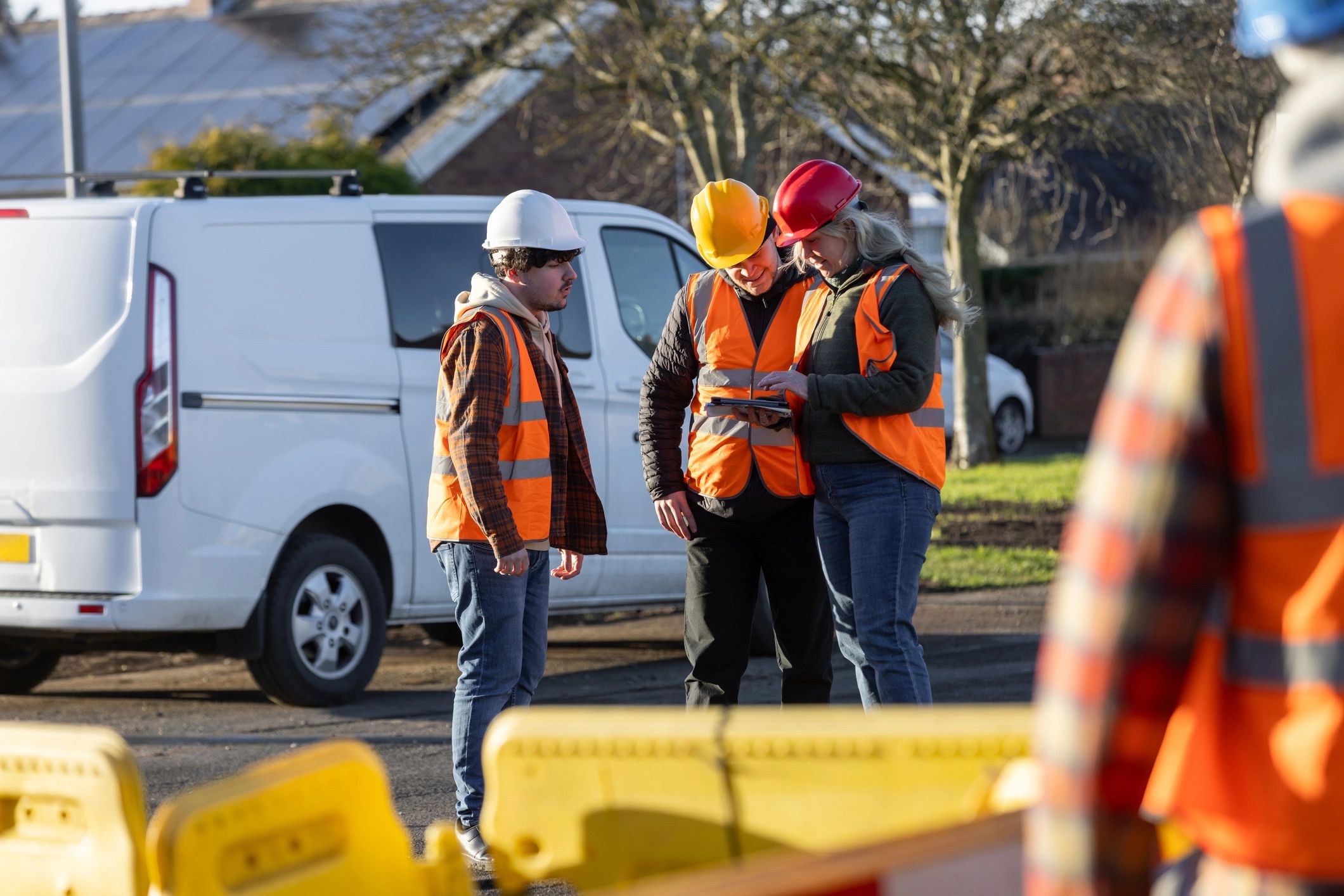 Environmental consultants coordinating compliance planning on site