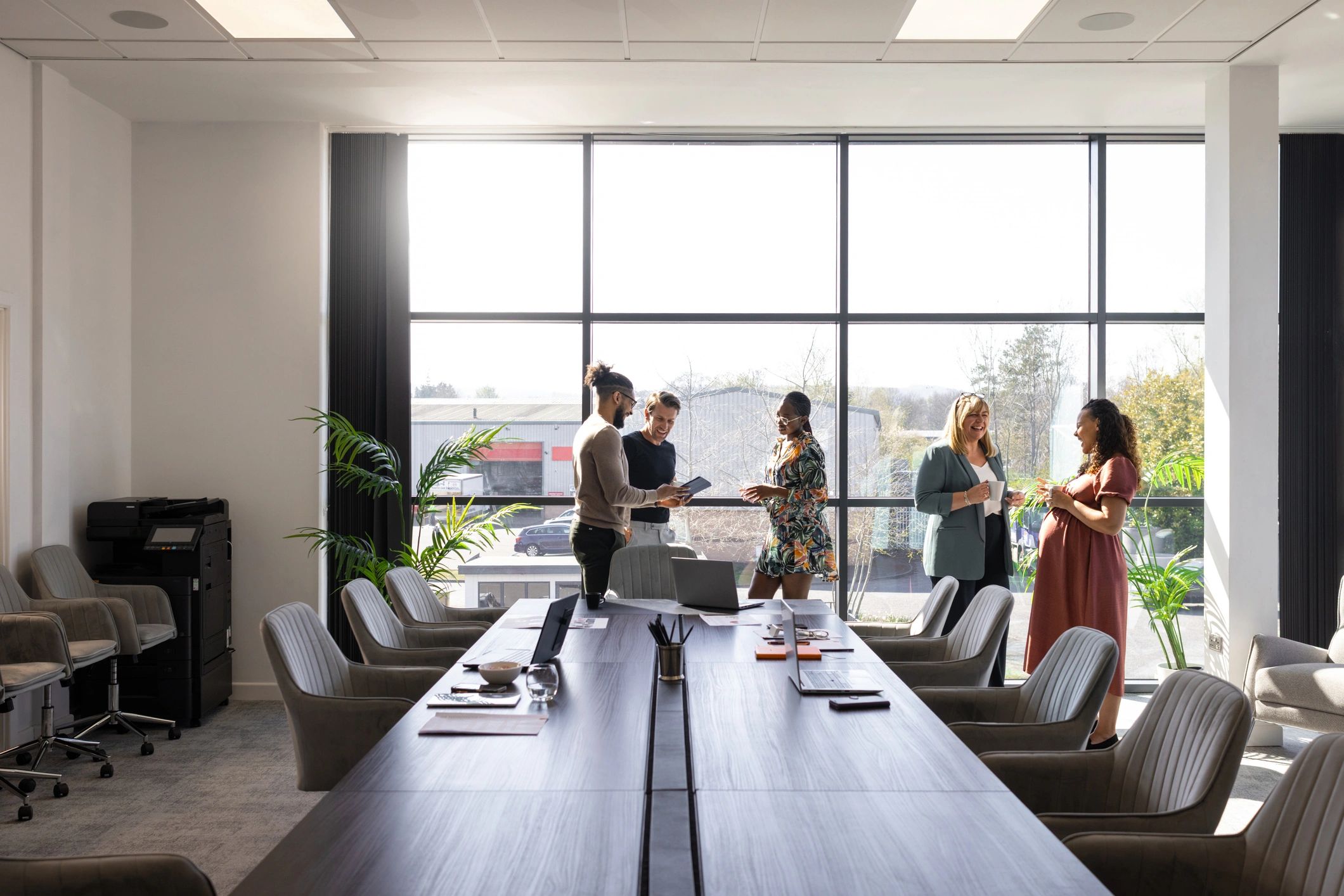 Business team discussing sustainability planning in an office
