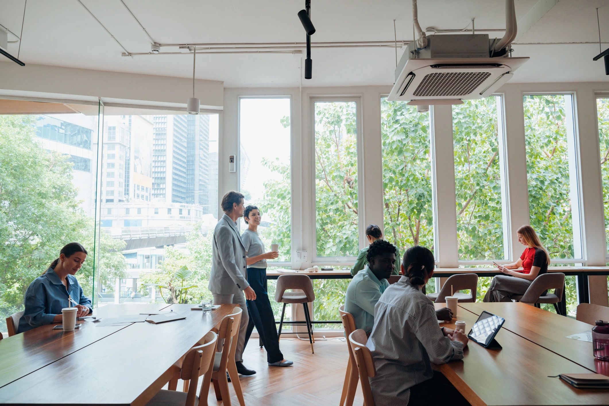 Professional consulting team collaborating in a modern office